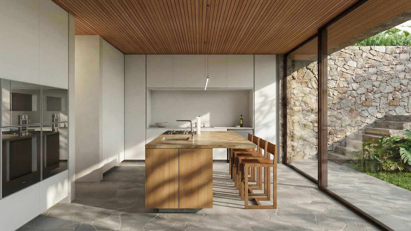 Cozinha da Casa Silente com ilha central e vista para o verde, projeto de interiores Studio Maio
