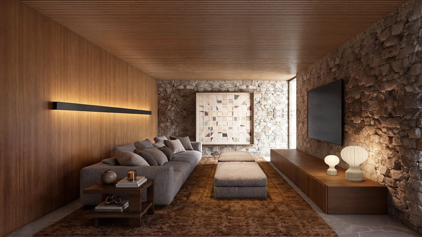 Sala íntima da Casa Silente revestida em pedra e madeira, design de interiores de alto padrão